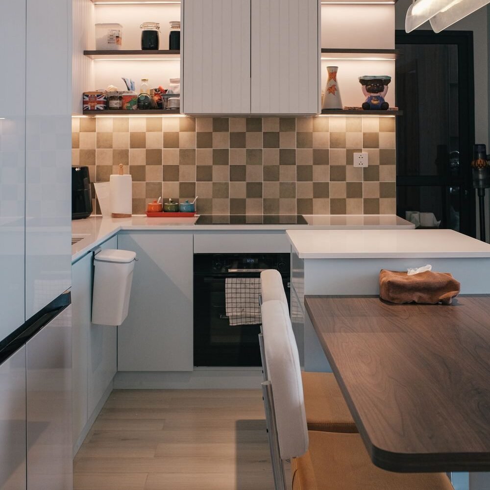 Island kitchen with warm lighting in an independent house
