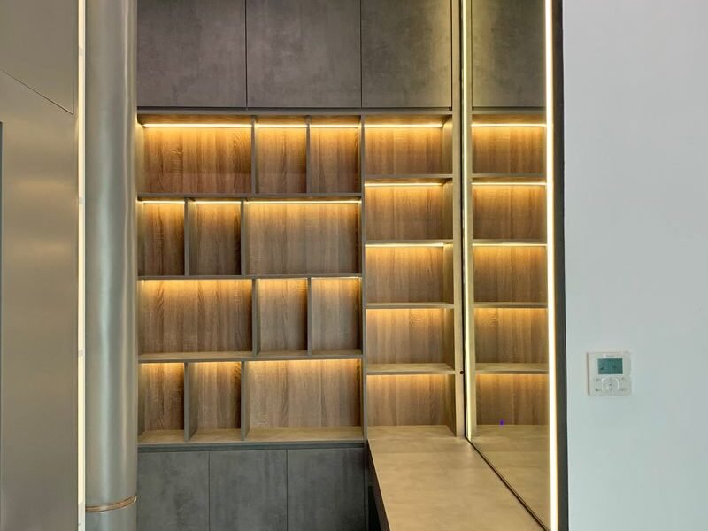 Built-in modular storage units with integrated shelf lighting